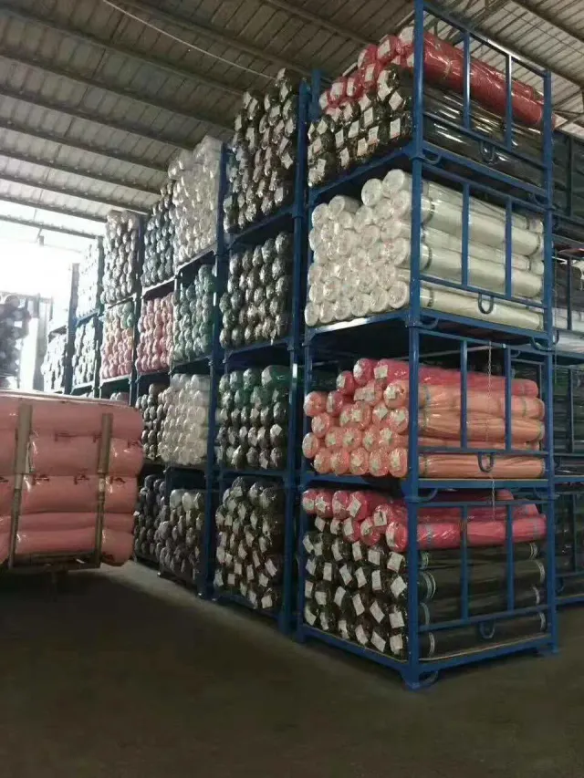 Stock fabric rolls on racks in the Senszx Fabrics warehouse